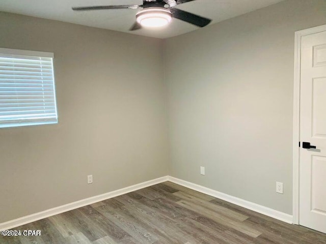 unfurnished room featuring ceiling fan and hardwood / wood-style floors