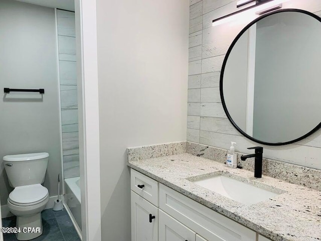 full bathroom with tile patterned floors, shower / bathtub combination, vanity, and toilet