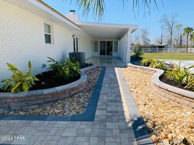 view of home's exterior featuring central air condition unit