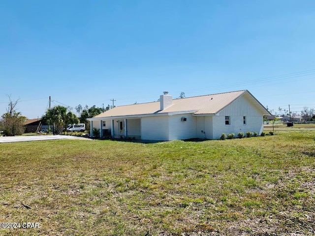 exterior space with a yard