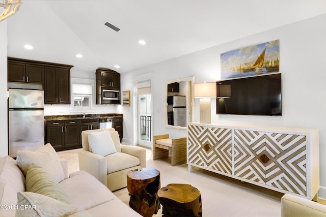 living room featuring sink