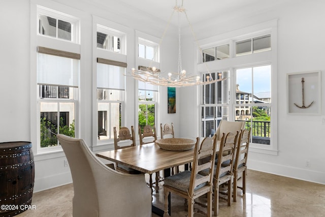 dining room featuring a notable chandelier