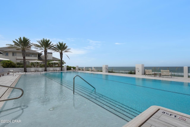 view of swimming pool featuring a patio