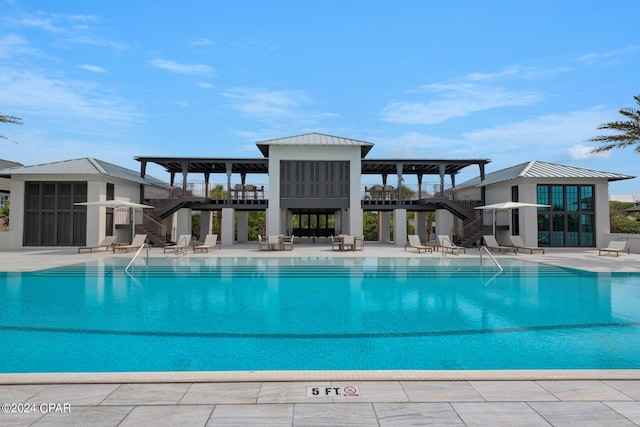 view of swimming pool featuring a patio