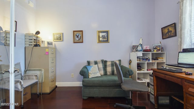 office with dark hardwood / wood-style flooring