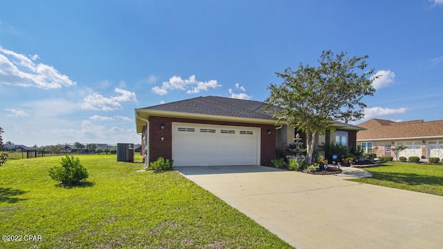 ranch-style home featuring a garage and a front yard