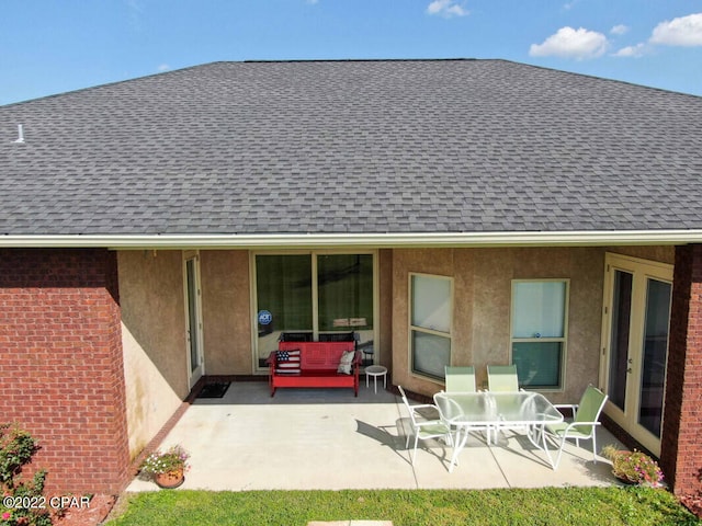 rear view of property with a patio area