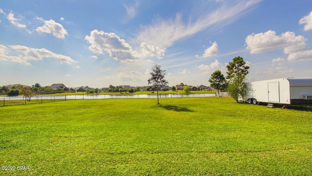 view of yard with a water view