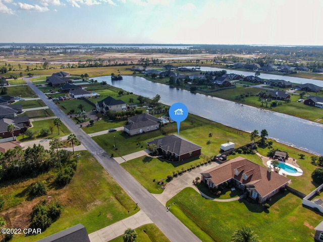 drone / aerial view with a water view