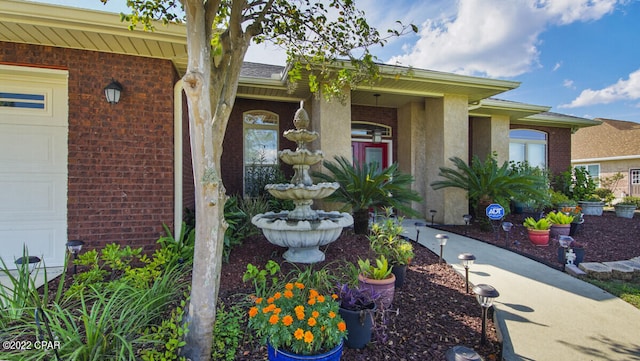 property entrance with a garage