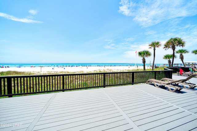 wooden deck with a water view