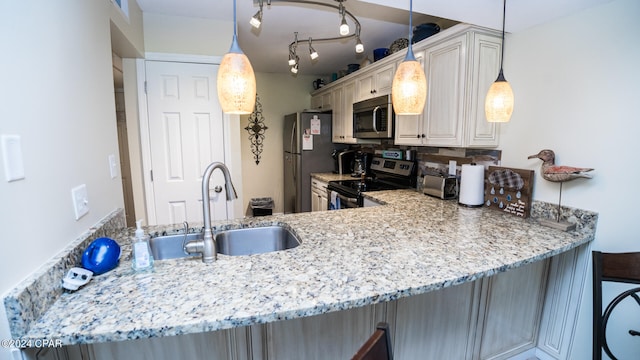 kitchen with sink, kitchen peninsula, stainless steel appliances, pendant lighting, and decorative backsplash