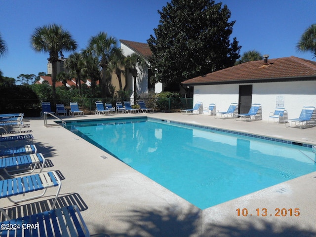 view of pool featuring a patio