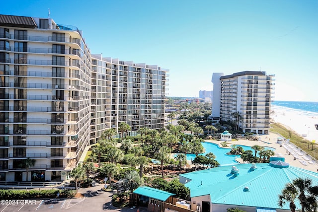 aerial view featuring a view of the beach and a water view