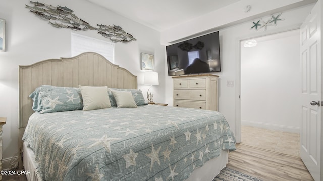 bedroom featuring light hardwood / wood-style floors