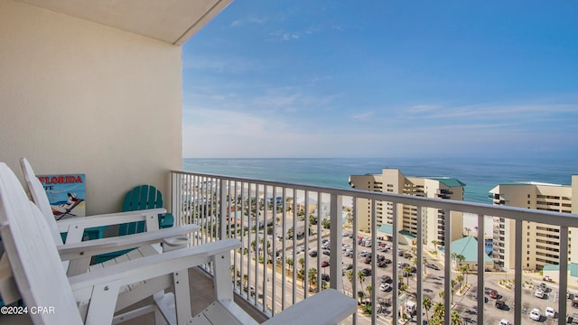 balcony featuring a water view