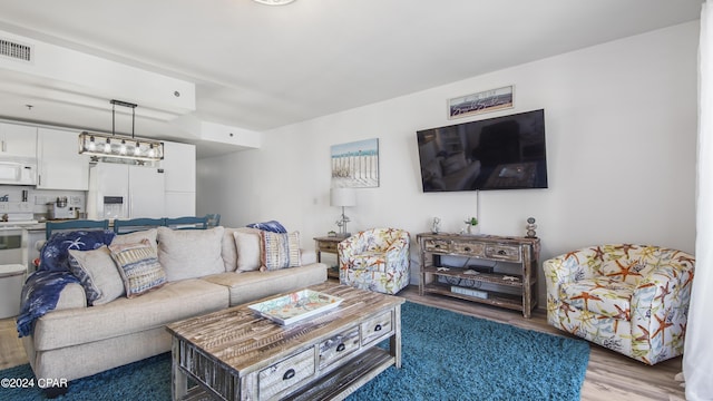 living room featuring hardwood / wood-style flooring