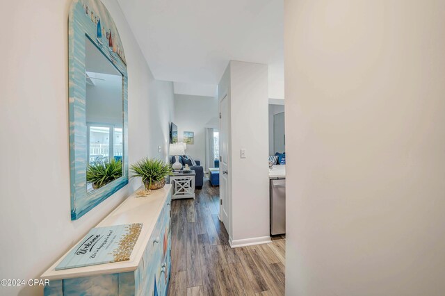 corridor featuring hardwood / wood-style floors