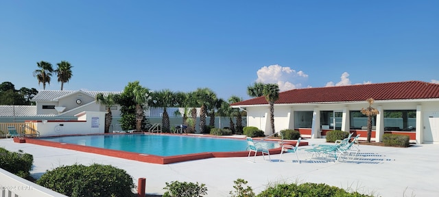 view of pool featuring a patio area