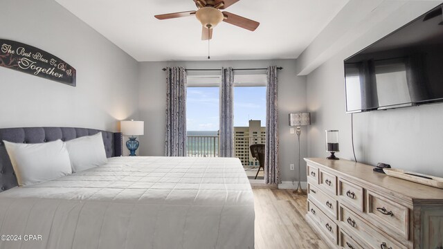 bedroom featuring ceiling fan and light wood-type flooring