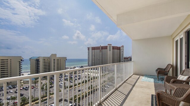 balcony featuring a water view