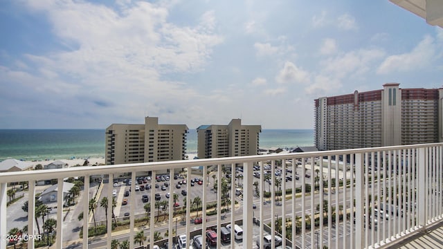 balcony featuring a water view