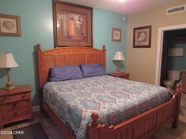 bedroom featuring tile patterned flooring