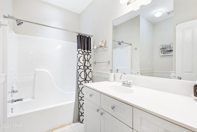 bathroom with visible vents, shower / bathtub combination with curtain, vanity, and tile patterned floors