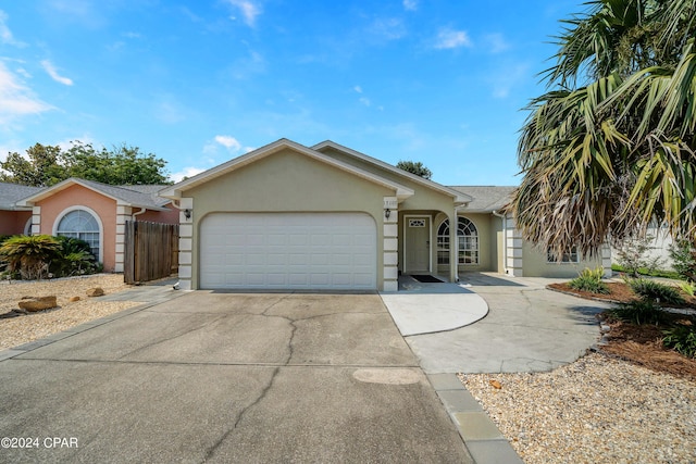 ranch-style house featuring a garage