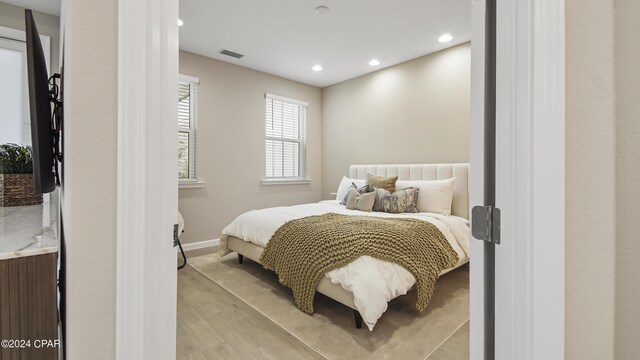 bedroom featuring light hardwood / wood-style flooring