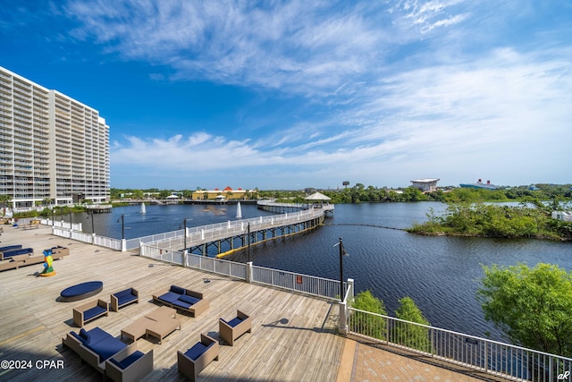 exterior space with an outdoor hangout area and a water view