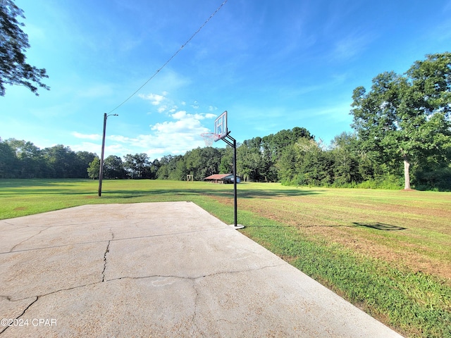 exterior space featuring community basketball court