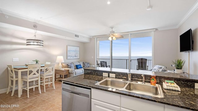 kitchen featuring sink, white cabinetry, hanging light fixtures, ornamental molding, and dishwasher