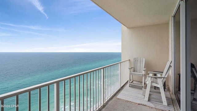 balcony featuring a water view