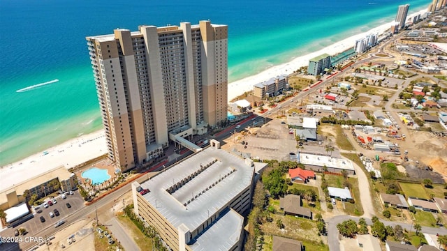 bird's eye view with a view of the beach and a water view