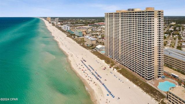 drone / aerial view with a view of the beach and a water view