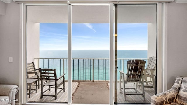 balcony featuring a water view