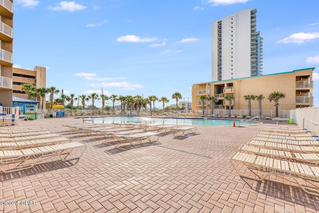 view of pool featuring a patio area