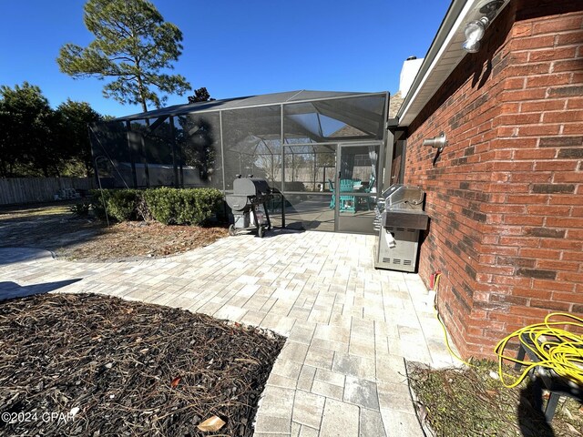 view of patio with a grill