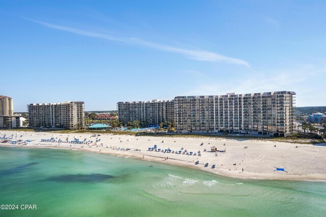 aerial view with a beach view and a water view