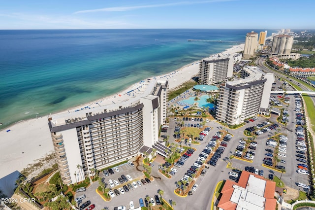 aerial view featuring a water view and a view of the beach