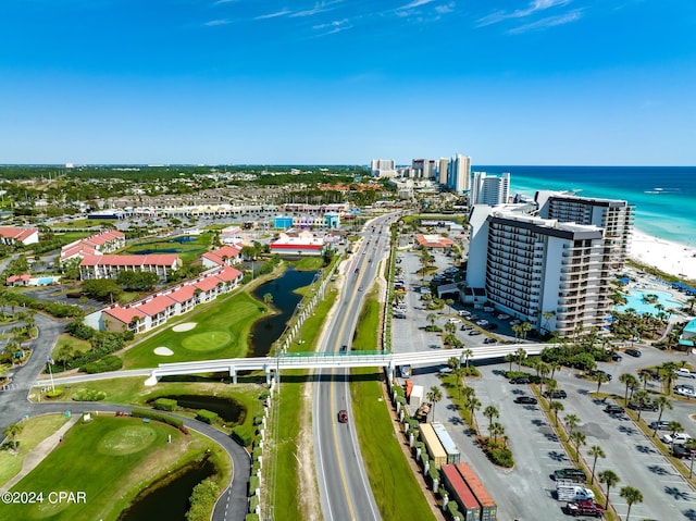 birds eye view of property featuring a view of the beach and a water view