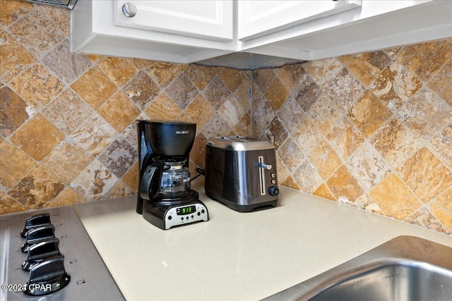 details featuring white cabinets