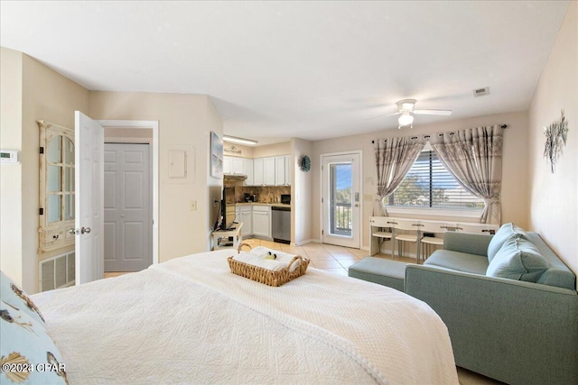 bedroom featuring light tile patterned floors, ceiling fan, and access to outside