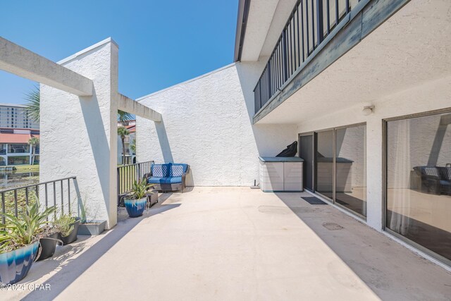 view of patio / terrace with a balcony