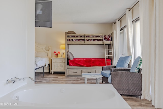 bedroom featuring wood-type flooring