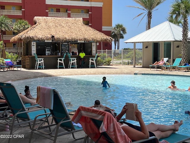 view of pool featuring a patio