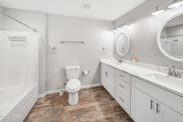 full bathroom with double sink vanity, shower / bathtub combination with curtain, wood-type flooring, and toilet