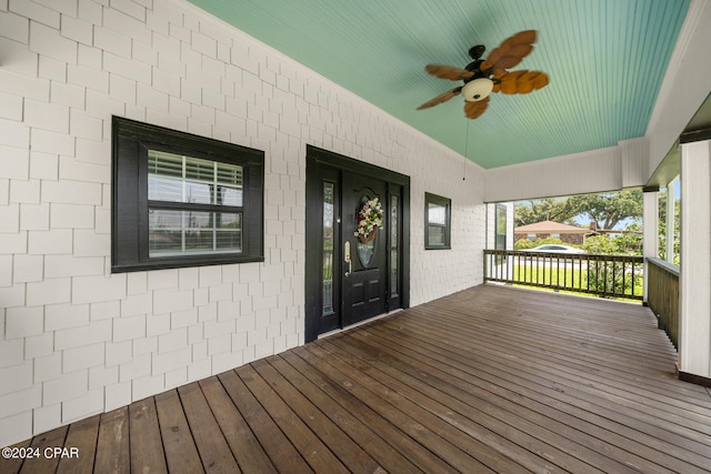 wooden terrace with ceiling fan