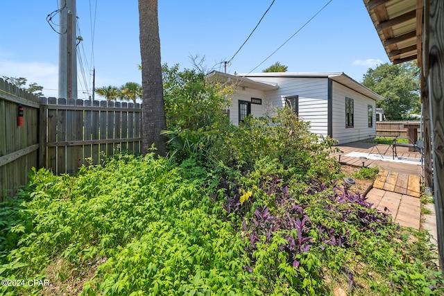 view of yard featuring a deck